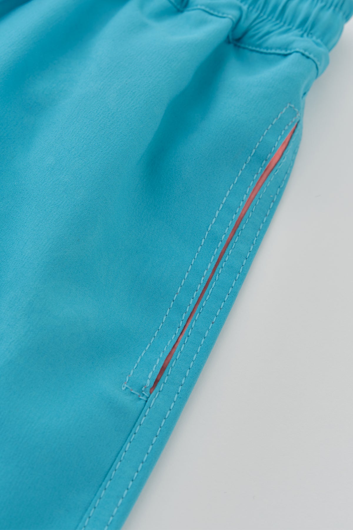 TURQUOISE - SALMON SWIM SHORT