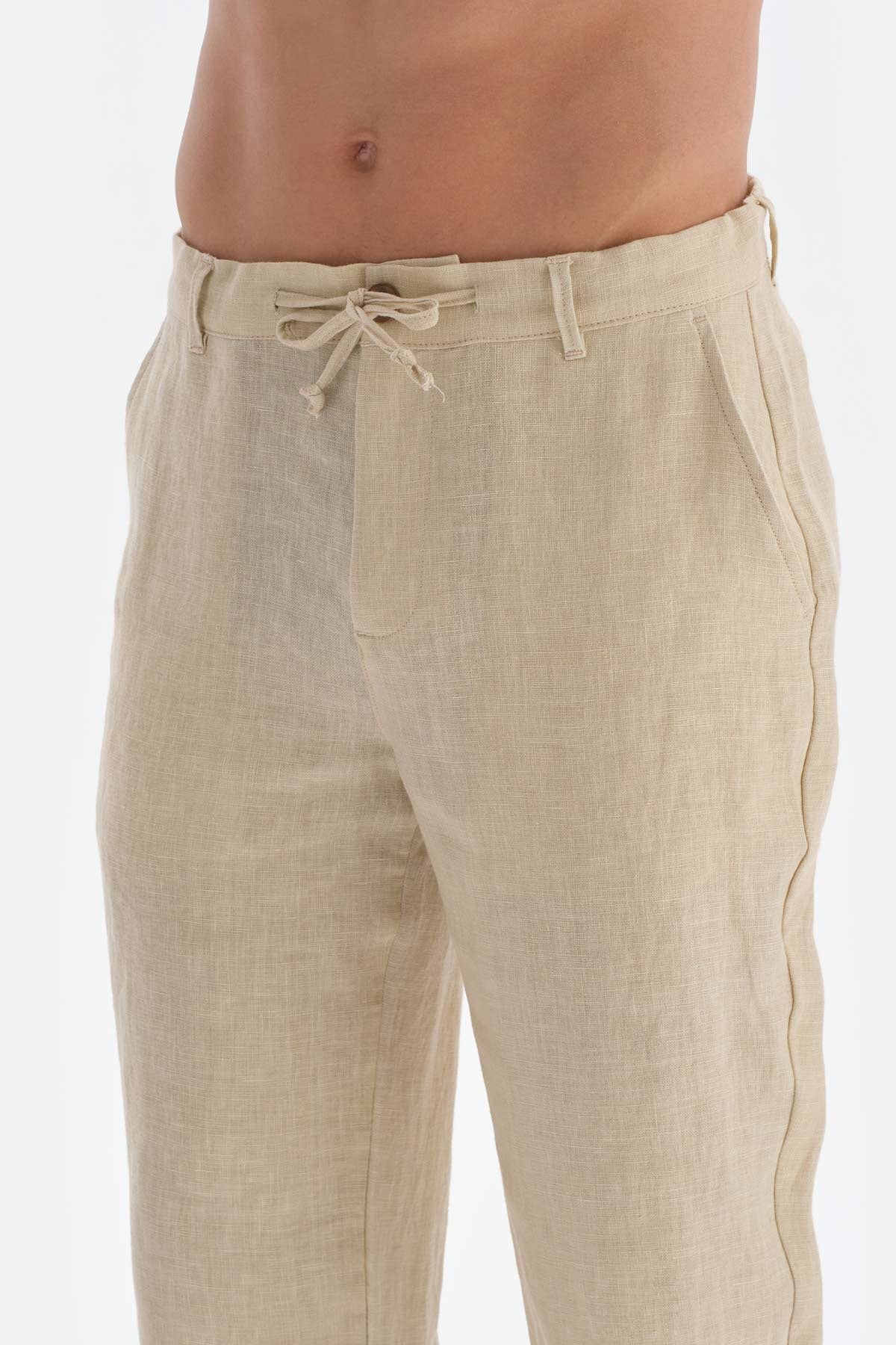 BEIGE TROUSERS