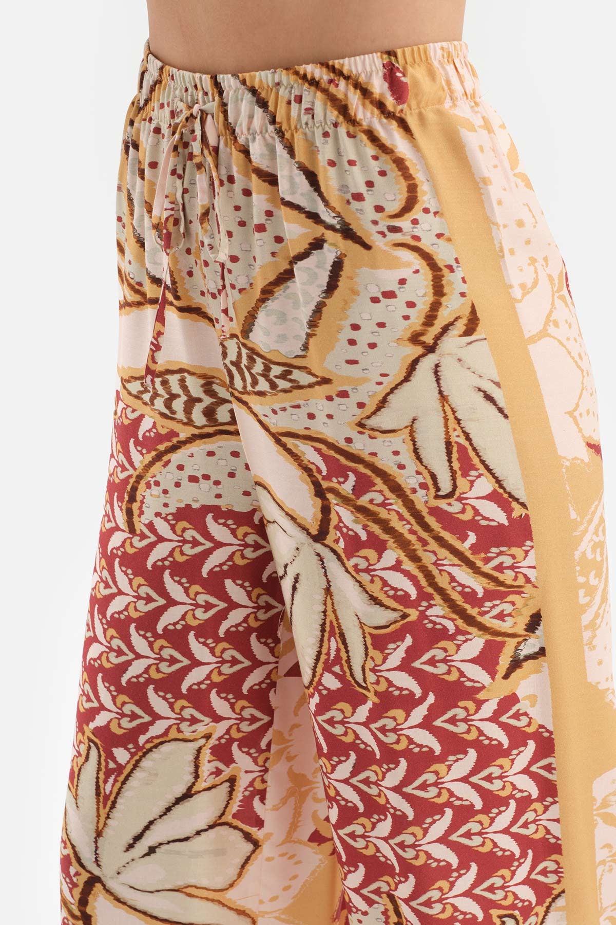 BEIGE PRINTED TROUSERS