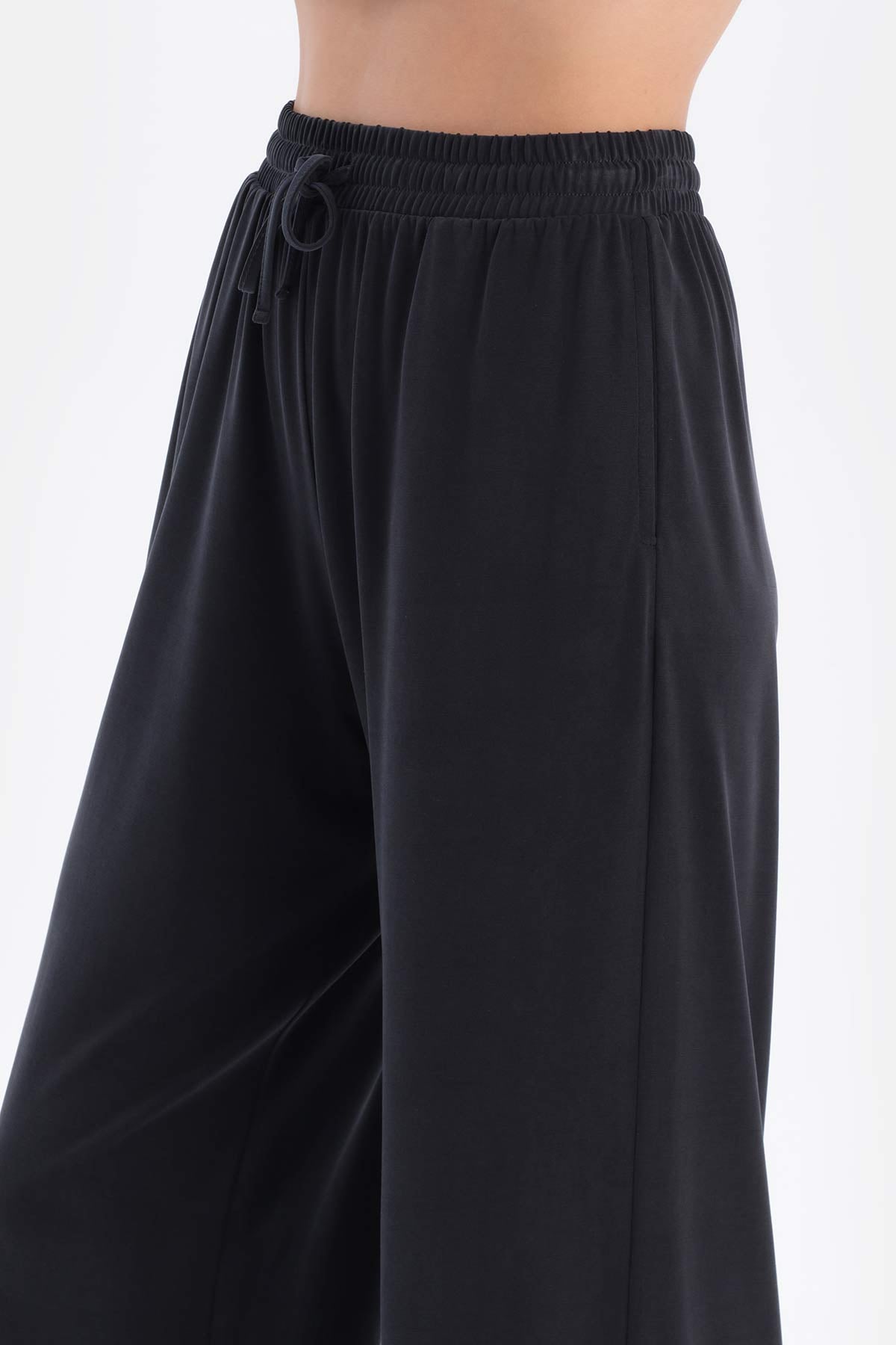 Black CUPRO TROUSERS WITH POCKETS